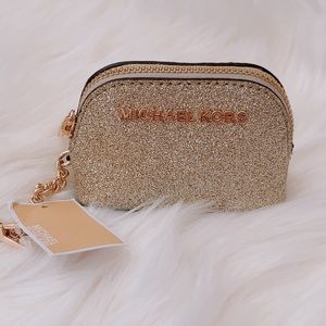 New with tag Michael Kors Giftables coin pouch key fob leather in pale gold